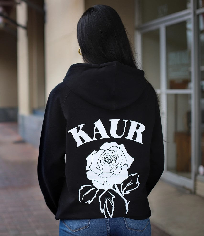 A black Kaur Roots hoodie